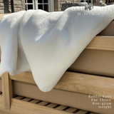 Indulge in the epitome of luxury with the One Preevay Faux Rabbit Fur Throw in Pure White. Inspired by the elegance of Fernando Botero and crafted from ultra-premium faux rabbit fur. Hypoallergenic, cruelty-free, over the sofa...