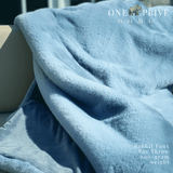 Indulge in the epitome of luxury with the One Preevay Faux Rabbit Fur Throw in Yacht Blue. Inspired by the elegance of Fernando Botero and crafted from ultra-premium faux rabbit fur. Hypoallergenic, cruelty-free, and lined with elegant velvet for refined warmth and sophistication. 800gsm, 50x60 inches. Warm and delicious Fur