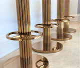 Atlas luxury Art Deco bar stool with custom bronze finish and premium velvet upholstery, showing Chrysler Building inspired design details..