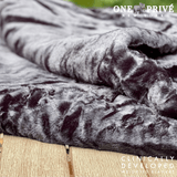 Experience luxurious relaxation with the One Preevay Luxury Home Furnishings, world's first weighted faux rabbit fur blanket, inspired by Fernando Botero. Clinically developed, 20lbs, queen size, and hypoallergenic warmth