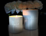 Indulge in the French Black Orchid Perfumed Estate Candle from One Preevay. Handcrafted with premium essential oils and organic soy wax, it features a pale gray ceramic vessel. With a triple wick and 21.2 oz size, enjoy the aromatic blend of blackberry, patchouli, and spices. Elevate your ambiance today..