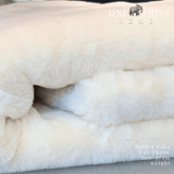 Indulge in the epitome of luxury with the One Preevay Faux Rabbit Fur Throw in Pure White. Inspired by the elegance of Fernando Botero and crafted from ultra-premium faux rabbit fur. Hypoallergenic, cruelty-free, and lined with elegant velvet for refined warmth and sophistication. 800gsm, 50x60 inches......