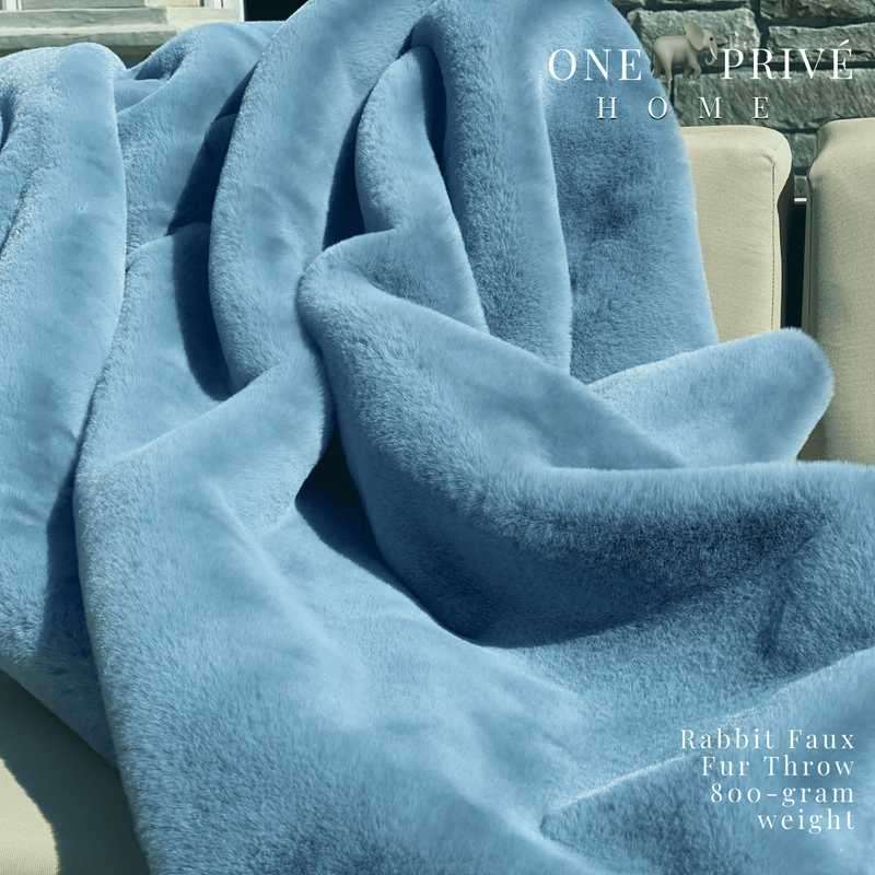 Indulge in the epitome of luxury with the One Preevay Faux Rabbit Fur Throw in Yacht Blue. Inspired by the elegance of Fernando Botero and crafted from ultra-premium faux rabbit fur. Hypoallergenic, cruelty-free, and lined with elegant velvet for refined warmth and sophistication. 800gsm, 50x60 inches stunning 