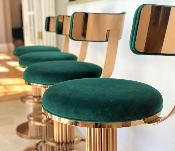 Atlas luxury Art Deco bar stool with custom bronze finish and premium velvet upholstery, showing Chrysler Building inspired design details