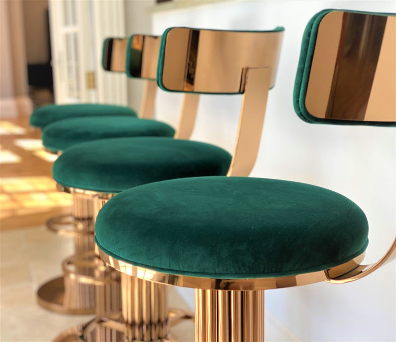 Atlas luxury Art Deco bar stool with custom bronze finish and premium velvet upholstery, showing Chrysler Building inspired design details