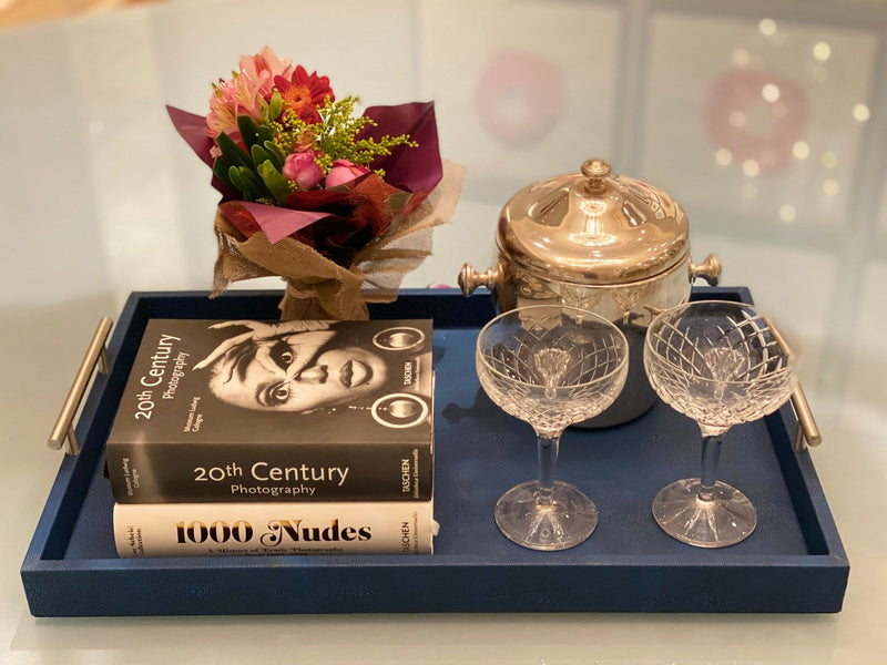 Discover the Canaan Shagreen Serving Tray from One Preevay—a luxurious tray crafted with sea blue exotic embossed leather and nickel hardware. Available in three sizes: 17"x10", 20"x13", and 23"x15". Elevate your entertaining experience with sophistication and style. Order now.
