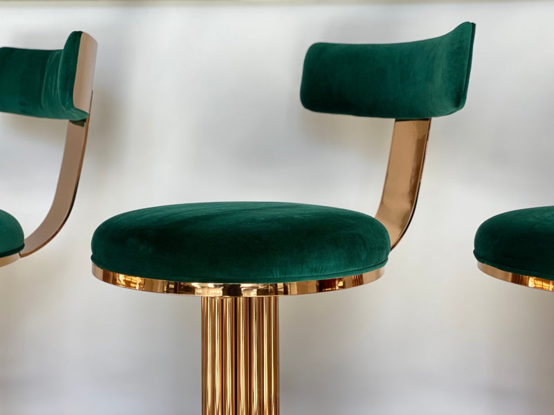 Discover the Atlas Bar Stool by One Preevay, inspired by the Chrysler Building. Customizable with textured bronze metal and plush velvet. Perfect for luxury residences and upscale spaces...