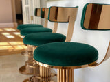 Discover the Atlas Bar Stool by One Preevay, inspired by the Chrysler Building. Customizable with textured bronze metal and plush velvet. Perfect for luxury residences and upscale spaces