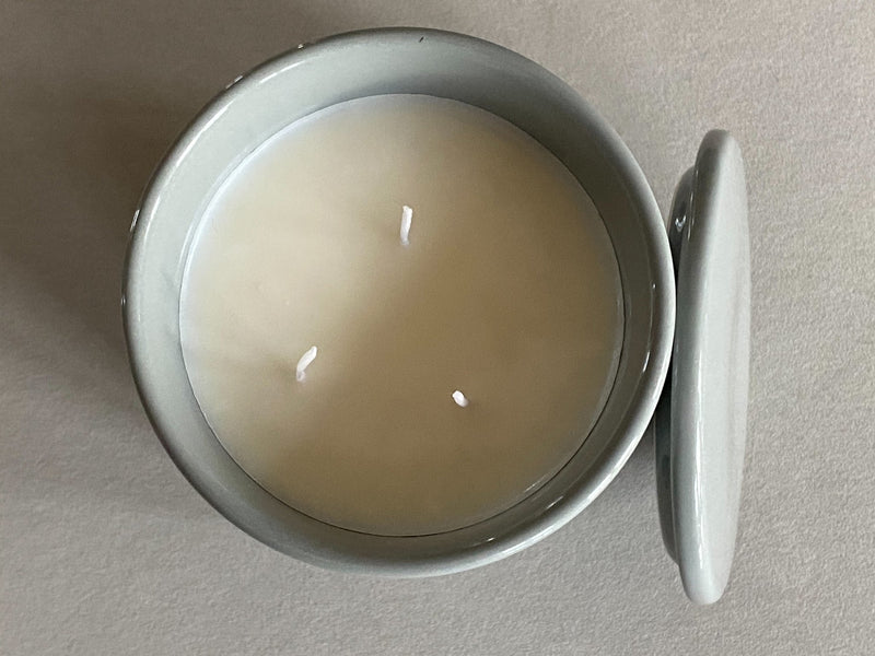 Discover the Moroccan Amber Perfumed Estate Candle from One Preevay. Handcrafted with essential oils and soy wax, this 21.2 oz candle features a triple wick and pale gray porcelain vessel. Enjoy the blend of sweet patchouli, heliotrope...