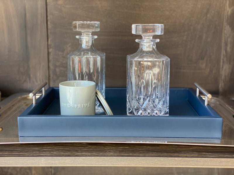 Discover the Porsche-Style Pierre Navy Leather Tray from One Preevay. Handcrafted with premium navy leather and nickel hardware, this limited edition tray exudes style and sophistication. Elevate your entertaining experience. Order now.
