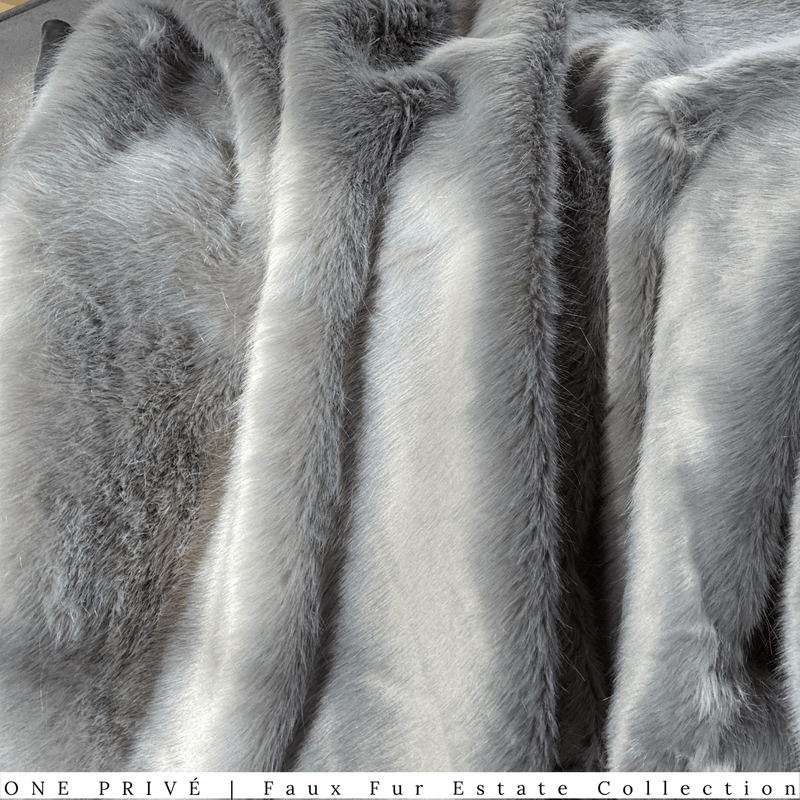 Indulge in the ultimate luxury with the One Preevay Silver Gray Sable Faux Fur Throw. Crafted from ultra-soft faux sable fur and lined with elegant velvet, this 950gsm, hypoallergenic throw is designed to provide warmth and sophistication. Perfect for adding a touch of elegance to any room. 50x60.... Elevate your space with One Preevay's Breakfast at Tiffany's Inspired Sable Faux Fur Throw - ultra-soft, 950gsm, silver gray, and 50x60 inches. Timeless elegance meets comfort in One Preevay's