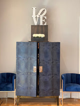 Experience ultra-luxury with One Preevay's bespoke Crocodile Armoire. Inspired by Louis XIV, this customizable piece combines elegance & functionality. Handcrafted with faux crocodile leather, ebony wood & marble handles....