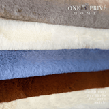 Indulge in the epitome of luxury with the One Preevay Faux Rabbit Fur Throw in Yacht Blue. Inspired by the elegance of Fernando Botero and crafted from ultra-premium faux rabbit fur. Hypoallergenic, cruelty-free, and lined with elegant velvet for refined warmth and sophistication. 800gsm, 50x60 inches and plush 