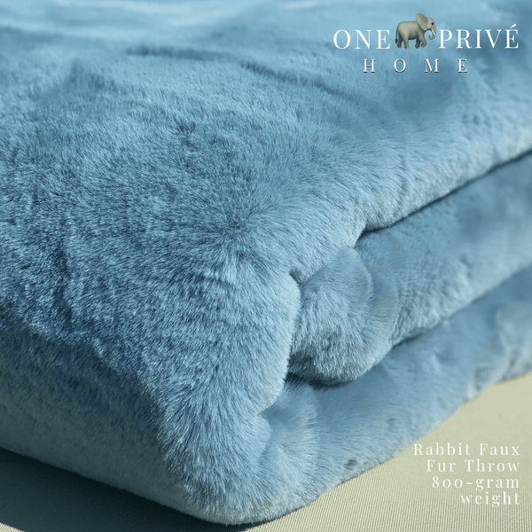 Indulge in the epitome of luxury with the One Preevay Faux Rabbit Fur Throw in Yacht Blue. Inspired by the elegance of Fernando Botero and crafted from ultra-premium faux rabbit fur. Hypoallergenic, cruelty-free, and lined with elegant velvet for refined warmth and sophistication. 800gsm, 50x60 inches.
