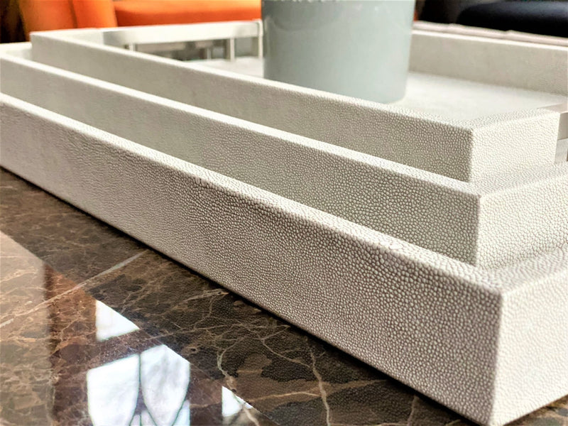 Luxury shagreen serving tray with inlaid nickel handles and ivory velvet underside"
Thursby Shagreen Hotel Tray - exotic embossed leather and nickel accents High-end serving tray with shagreen leather, inlaid nickel handles, and velvet underside" "Luxury entertaining tray - Thursby Shagreen, embossed leather, nickel handles"
"Shagreen leather serving tray with inlaid nickel handles and elegant design"
Luxury serving trays