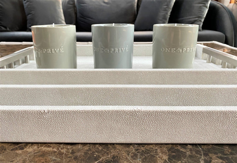 Discover the Thursby Shagreen Hotel Tray from One Preevay—a luxurious serving tray crafted with exotic embossed leather and nickel hardware. Available in three sizes: 17"x10", 20"x13", and 23"x15". Elevate entertaining experience with sophistication and style. Order now.
