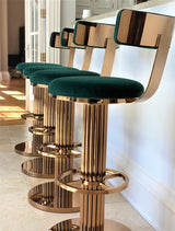 Atlas luxury Art Deco bar stool with custom bronze finish and premium velvet upholstery, showing Chrysler Building inspired design details.........