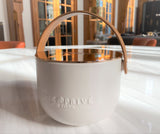 Discover the Grapefruit Neroli Perfumed Estate Candle from One Preevay. Handcrafted with premium essential oils and soy wax, it features a porcelain bowl with a silver-plated lid and leather strap. Enjoy the aromatic fusion of grapefruit and neroli. Order now to elevate your ambiance with love. 
