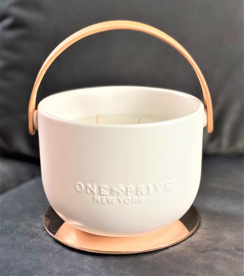 Discover the Lavender and Vanilla Perfumed Estate Candle from One Preevay. Handcrafted with premium essential oils and soy wax, it features a porcelain bowl with a silver-plated lid and leather strap. With a triple wick and 15.8 oz size, enjoy the aromatic blend of lavender and vanilla. Order now to elevate your ambiance....