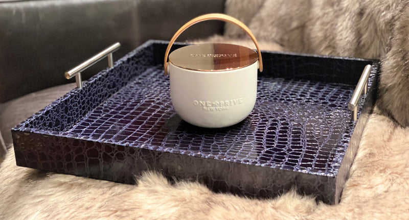 Discover the Lavender and Vanilla Perfumed Estate Candle from One Preevay. Handcrafted with premium essential oils and soy wax, it features a porcelain bowl with a silver-plated lid and leather strap. With a triple wick and 15.8 oz size, enjoy the aromatic blend of lavender and vanilla. Order now to elevate your ambiance....