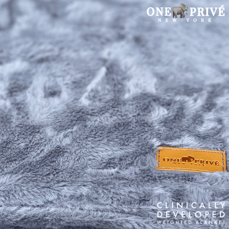 Experience luxurious relaxation with One Preevay's world's first weighted faux rabbit fur blanket, inspired by Fernando Botero. Clinically developed, 20lbs, hypoallergenic, and luxurious...