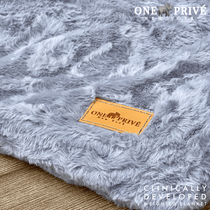 Experience luxurious relaxation with One Preevay's world's first weighted faux rabbit fur blanket, inspired by Fernando Botero. Clinically developed, 20lbs, hypoallergenic.