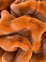 Experience luxury redefined with ONE Preevay's Faux Rabbit Fur Throw in Coco Brown. Inspired by Fernando Botero and crafted from Ultra Premium Faux Rabbit Fur. Hypoallergenic, cruelty-free, and lined with elegant velvet for refined warmth and sophistication. 800gsm, 50x60 inche