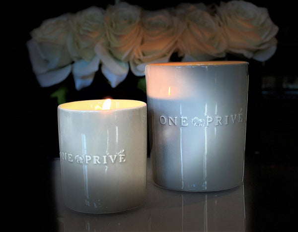 Indulge in the French Black Orchid Perfumed Estate Candle from One Preevay. Handcrafted with premium essential oils and organic soy wax, it features a pale gray ceramic vessel. With a triple wick and 21.2 oz size, enjoy the aromatic blend of blackberry, patchouli, and spices. Elevate your ambiance today..
