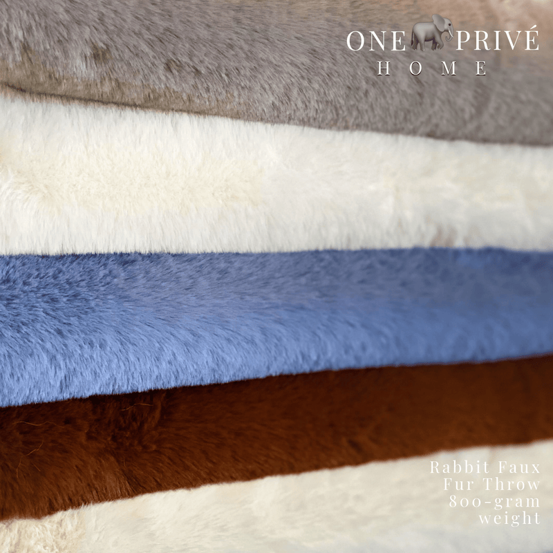 Indulge in the epitome of luxury with the One Preevay Faux Rabbit Fur Throw in Yacht Blue. Inspired by the elegance of Fernando Botero and crafted from ultra-premium faux rabbit fur. Hypoallergenic, cruelty-free, and lined with elegant velvet for refined warmth and sophistication. 800gsm, 50x60 inch