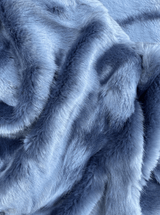 Indulge in the irresistible luxury of the Sable Faux Fur Throw in Midnight Blue from One Preevay Luxury Home Decor Imagine  supple texture of Faux Sable paired with plush velvet, creating an enduring design to elevate the sophistication and ambiance of your special space.

Faux sable fur is renowned for its luxurious feel and appearance. It is incredibly soft and smooth, with a texture that remains consistent 
Luxurious..."Indulge in timeless luxury with One Preevay's Breakfast at Tiffany's Inspired Sable