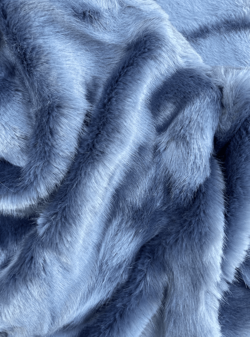 Indulge in the irresistible luxury of the Sable Faux Fur Throw in Midnight Blue from One Preevay Luxury Home Decor Imagine  supple texture of Faux Sable paired with plush velvet, creating an enduring design to elevate the sophistication and ambiance of your special space.

Faux sable fur is renowned for its luxurious feel and appearance. It is incredibly soft and smooth, with a texture that remains consistent 
Luxurious..."Indulge in timeless luxury with One Preevay's Breakfast at Tiffany's Inspired Sable