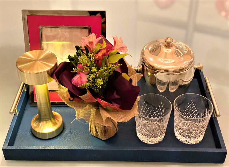 Discover the Canaan Shagreen Serving Tray from One Preevay—a luxurious tray crafted with sea blue exotic embossed leather and nickel hardware. Available in three sizes: 17"x10", 20"x13", and 23"x15". Elevate your entertaining experience with sophistication and style. Order now....
