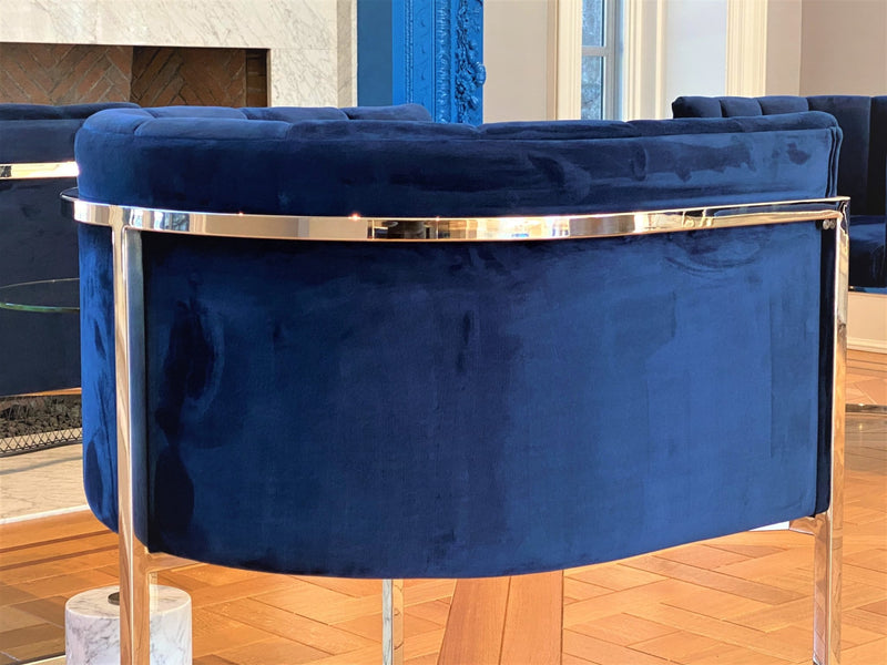 Discover the One Preevay Arc Dining Chair. Inspired by the Arc de Triomphe, this customizable luxury chair features a nickel frame and plush velvet. Perfect for upscale residences and hospitality venues. Minimum order of 8 chairs window light fire place